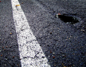 how can potholes damage my vehicle